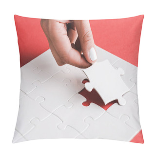 Personality  Cropped View Of Woman Holding White Jigsaw Near Connected Puzzle Pieces On Red Pillow Covers