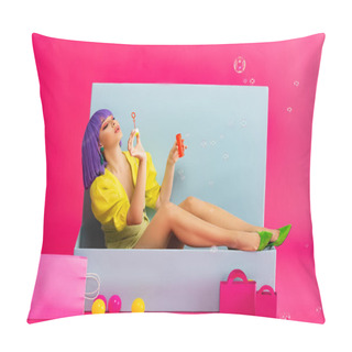 Personality  Attractive Girl In Purple Wig As Doll Blowing Soap Bubbles While Sitting In Blue Box With Balls And Shopping Bags, On Pink Pillow Covers