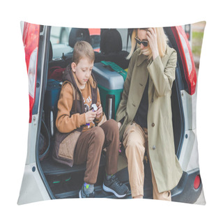 Personality  Little Kid Sitting With Mother In Car Trunk Full Of Luggage Eating Chocolate Candies. Car Travel Concept Pillow Covers