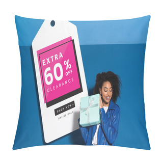 Personality  Smiling African American Woman With Gift Near Big Price Tag With Extra 60 Percent Off Clearance Illustration On Blue Background Pillow Covers