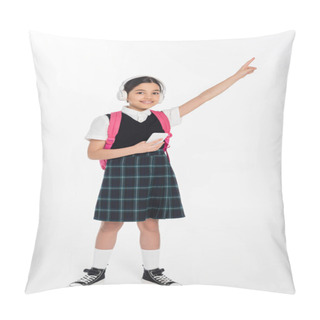 Personality  Digital Age, Cheerful Schoolgirl In Wireless Headphones Holding Smartphone On White, Pointing Away Pillow Covers