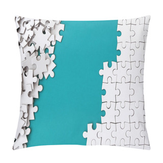 Personality  Fragment Of A Folded White Jigsaw Puzzle And A Pile Of Uncombed Puzzle Elements Against The Background Of A Blue Surface. Texture Photo With Space For Text Pillow Covers
