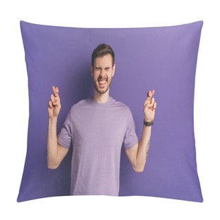 Personality  Excited Young Man Holding Crossed Fingers While Standing With Closed Eyes On Purple Background Pillow Covers