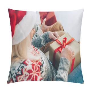 Personality  Selective Focus Of Senior Woman In Santa Hat Opening Gift Box Near Husband Pillow Covers