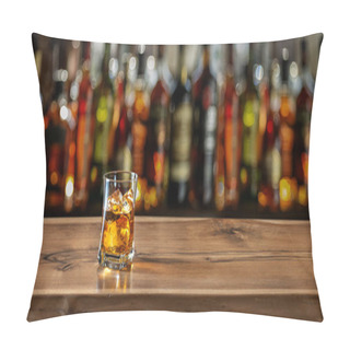 Personality  Glass Of Whiskey On The Bar Counter. Blurred Interior Of Bar At The Background. Pillow Covers