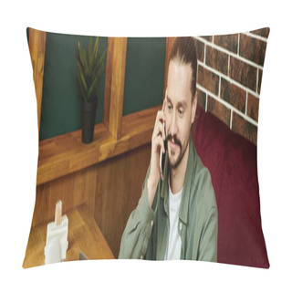 Personality  A Man Sitting On A Couch, Engrossed In A Conversation On A Cell Phone. Pillow Covers