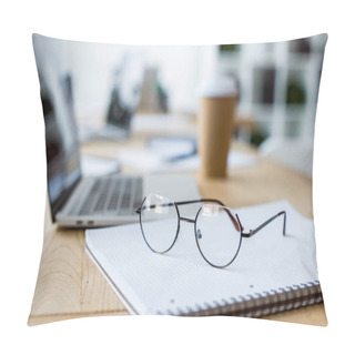 Personality  Glasses On Notebook And Coffee To Go On Wooden Table In Office Pillow Covers