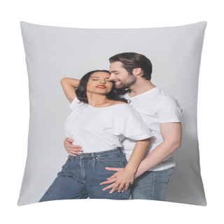 Personality  Smiling Man Hugging Seductive Woman Standing With Hand Behind Head And Closed Eyes On Grey Pillow Covers