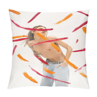 Personality  Queer Person With Shirtless Tattooed Body Holding Hands In Pockets Of Jeans Behind Glass With Colorful Paint Strokes On White Background Pillow Covers
