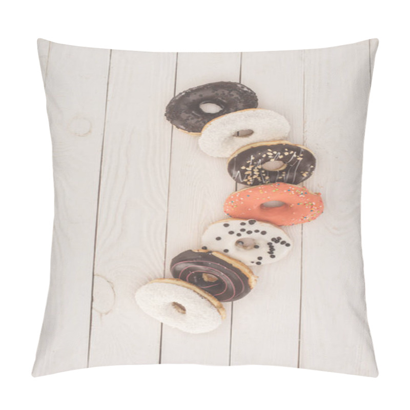 Personality  donuts on wooden table top pillow covers