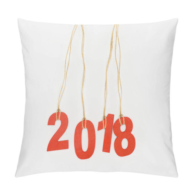 Personality  close up view of 2018 year sign hanging on strings isolated on white pillow covers