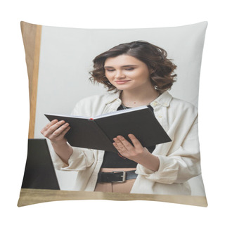 Personality  Cheerful Concierge In Trendy Casual Clothes And With Wavy Brunette Hair Looking At Notebook Near Computer Monitor While Working At Reception Desk In Contemporary Hotel, Digital Nomad  Pillow Covers