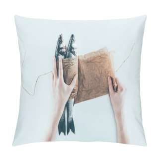Personality  Cropped Shot Of Hands Wrapping Sea Fish In Paper And Tying With Rope On Grey Pillow Covers