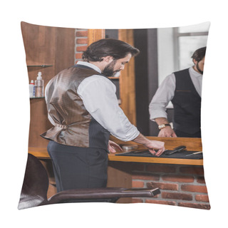 Personality  Handsome Young Barber In Stylish Vest Taking Tools From Rubber Mat On Workplace Pillow Covers