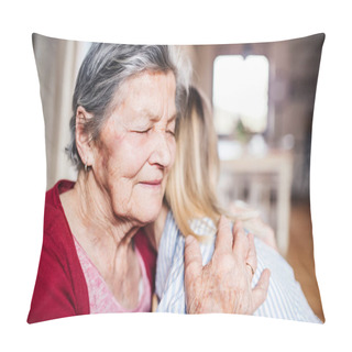 Personality  An Elderly Grandmother With An Adult Granddaughter At Home, Hugging. Pillow Covers
