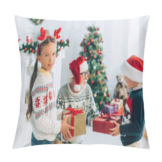 Personality  Senior Man In Santa Hat Taking Presents From Grandchildren On Christmas Pillow Covers