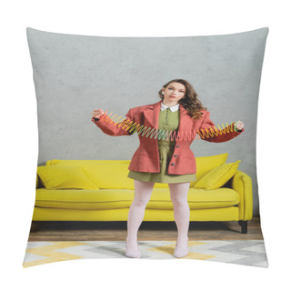 Personality  Young Brunette Woman Posing Like A Doll And Playing With Rainbow Slinky, Looking At Camera, Modern Living Room With Yellow Couch, Childish, Vintage, Nostalgia, Colorful Toy, Leisure And Fun  Pillow Covers