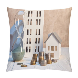 Personality  Houses Models On White Wooden Table Near Hourglass And Coins, Real Estate Concept Pillow Covers