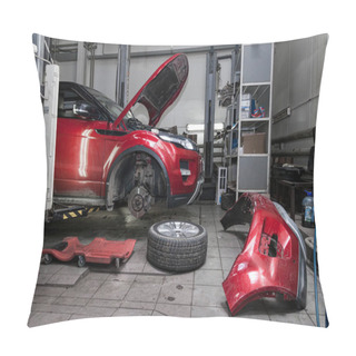 Personality  Red Used Car With An Open Hood Raised On A Lift For Repairing Th Pillow Covers