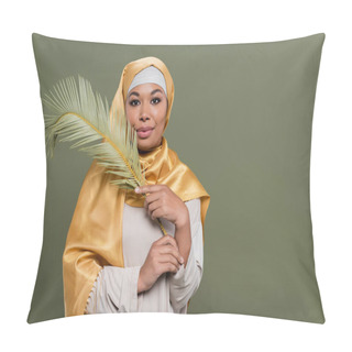 Personality  Happy Multiracial Woman With Makeup Wearing Yellow Satin Hijab And Holding Exotic Leaf Isolated On Green Pillow Covers