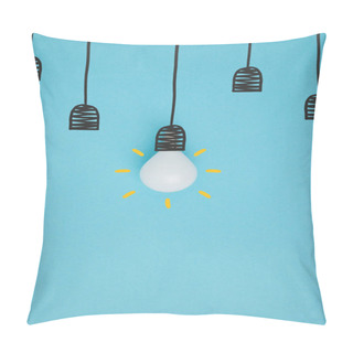 Personality  Top View Of Light Bulb Pretending Hanging On Lamp Holder Isolated On Blue Pillow Covers