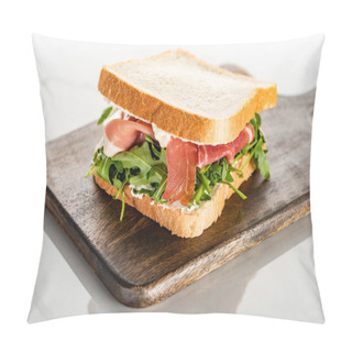 Personality  Selective Focus Of Fresh Green Sandwich With Arugula And Prosciutto On Wooden Cutting Board On White Marble Surface Pillow Covers