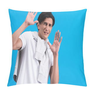 Personality  Portrait Of Frightened Young Man With Hands Up, Isolated On Blue Pillow Covers