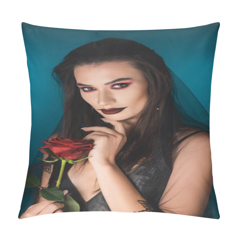 Personality  mysterious young woman with black veil and makeup holding red rose on blue pillow covers
