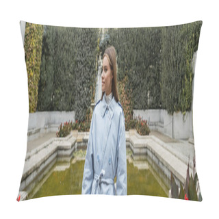 Personality  Young Woman In Blue Trench Coat Standing Near Fountain With Green Water In Park, Banner  Pillow Covers