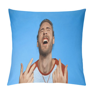 Personality  Young Bearded Man With Closed Eyes Gesturing While Laughing On Blue  Pillow Covers