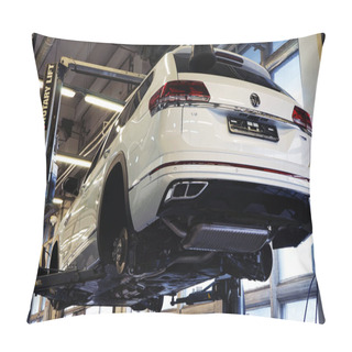 Personality  Moscow Russia - November 2021: A Modern Car In A Car Service On A Lift With Wheels Removed. Pillow Covers