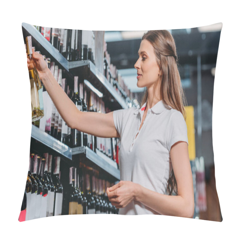 Personality  Side View Of Female Shop Assistant With Bottle Of Wine In Hypermarket Pillow Covers