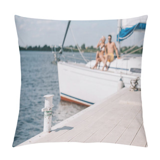 Personality  Selective Focus Of Wooden Pier And Young Couple On Yacht Behind Pillow Covers