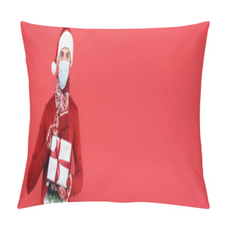 Personality  Man In Santa Hat And Medical Mask Holding Gift Isolated On Red, Banner Pillow Covers