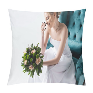 Personality  Smiling Bride In Elegant Wedding Dress Holding Flowers While Sitting In Armchair And Touching Face Isolated On White Pillow Covers
