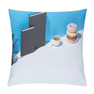 Personality  Tasty Donuts, Coffee Cup, Pencil Holder And Notebooks On White Desk And Blue Background Pillow Covers