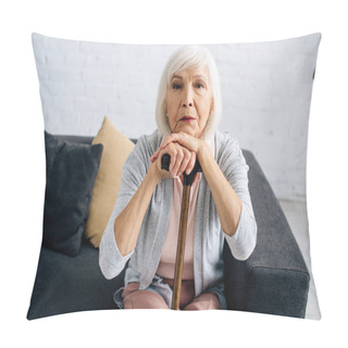 Personality  Senior Woman With Wooden Cane Looking At Camera In Apartment  Pillow Covers