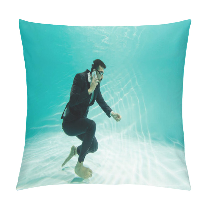 Personality  Muslim businessman in suit talking on smartphone underwater in pool  pillow covers