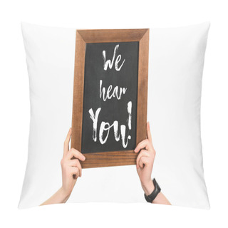Personality  Cropped Image Of Woman Hands Holding Board With Lettering We Hear You Isolated On White Pillow Covers
