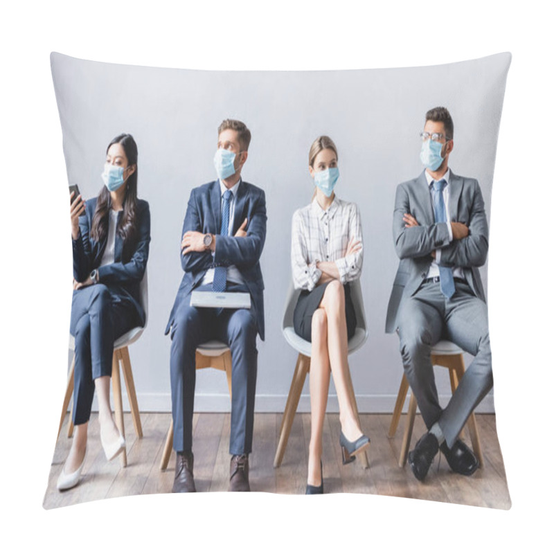 Personality  Multicultural business people in medical masks with devices waiting job interview in hall  pillow covers