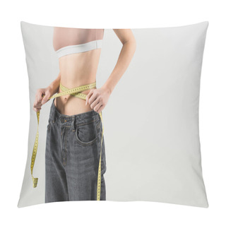Personality  Cropped View Of Slender Woman In Sports Top And Jeans Measuring Waist Isolated On Grey Pillow Covers