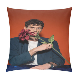 Personality  Stylish Young Man In Blazer Holding Burgundy Dahlia Flower On Red Background Pillow Covers