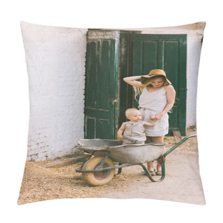 Personality  Woman Holding Sons Hand While He Standing In Wheelbarrow At Countryside Pillow Covers