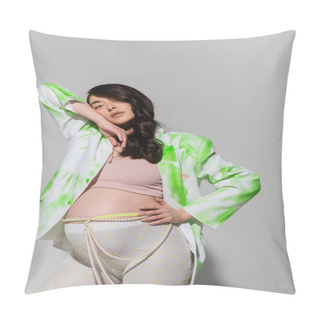 Personality  Pregnant Woman With Wavy Brunette Hair Posing In Crop Top, Green And White Blazer, Beads Belt And Leggings While Looking At Camera On Grey Background, Fashionable Maternity Concept, Expectation Pillow Covers