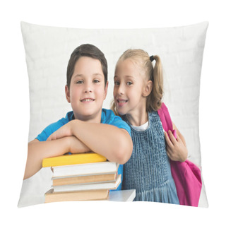 Personality  Portrait Of Smiling Boy At Table With Books And Little Sister With Backpack Near By At Home Pillow Covers