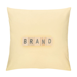 Personality  Top View Of Brand Lettering Made Of Wooden Cubes On Yellow Background Pillow Covers