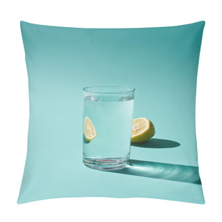 Personality  Transparent Glass With Fresh Water And Lemon Half On Turquoise Background Pillow Covers