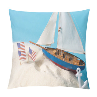 Personality  American National Flags In White Sand Near Miniature Ship And Anchor Isolated On Blue Pillow Covers