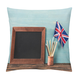 Personality  Empty Chalkboard Near Pencils And Uk Flag On Wooden Table Near Blue Wall Pillow Covers