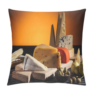 Personality  Different Types Of Appetizing Cheeses On Cutting Board On Orange Pillow Covers